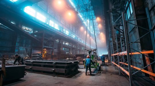 Metallurgical plant or Steel Factory, Large Workshop Interior with industrial cranes and workers, Heavy Industry, Iron and Steelmaking.